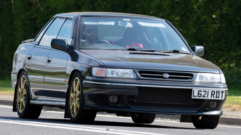 classic Subaru Legacy on road