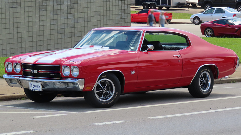 A red 1970 Chevelle SS on a town road