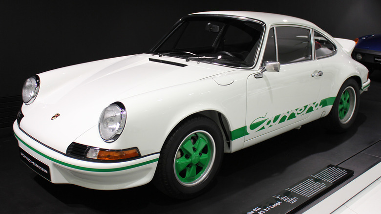 A white and green Porsche 911 from 1973