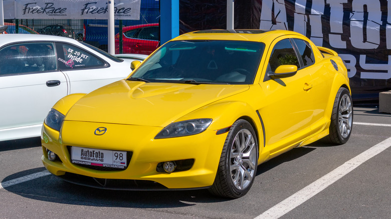 Yellow Mazda RX-8