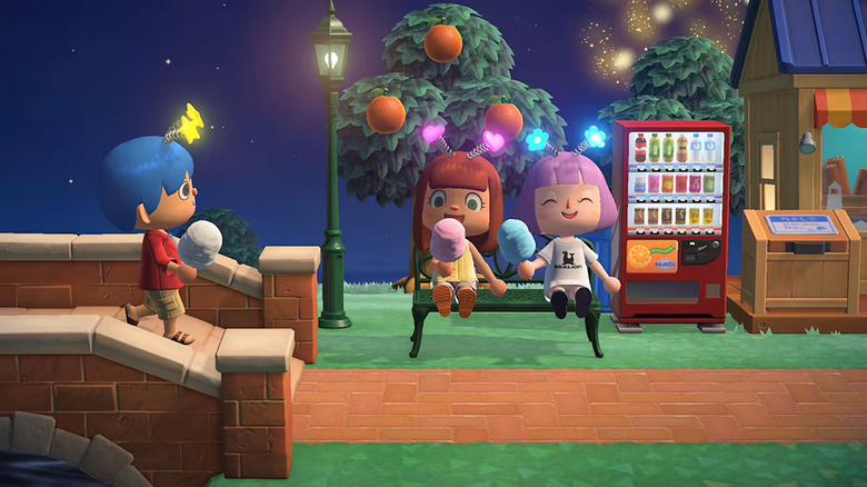Three players enjoying cotton candy in Animal Crossing