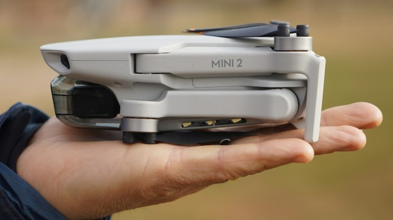 DJI Mini 2 held in a hand