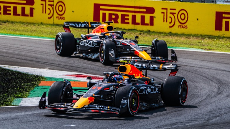 Two Red Bull RB18 cars on the race track