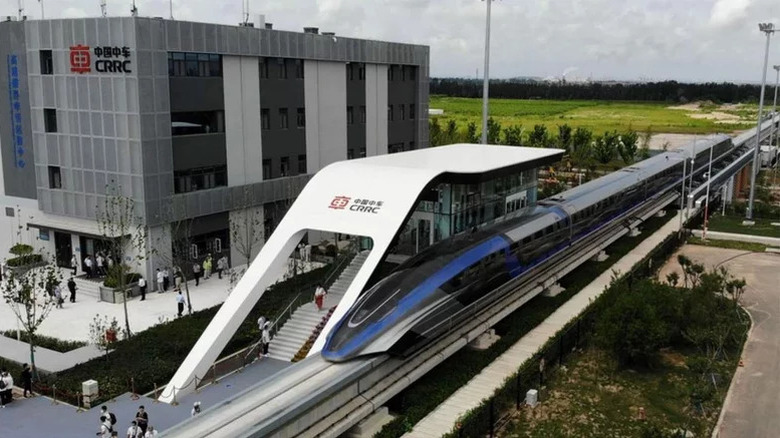 China's fastest maglev train docked at a station.