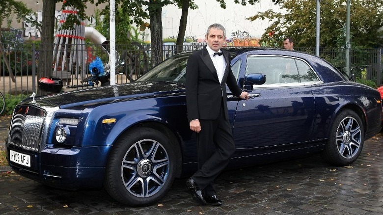 Rowan Atkinson with exotic car 