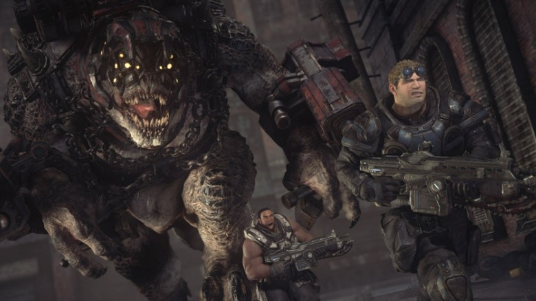 Two COG soldiers running from a dinosaur-like Locust monster.