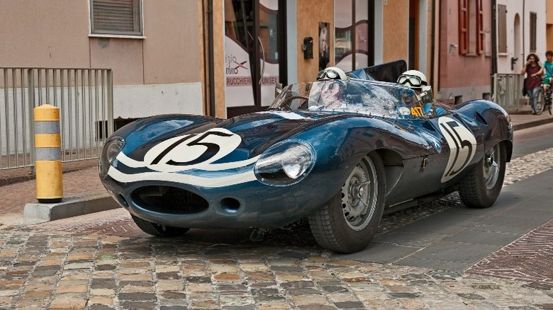 Jaguar D-Type with race numbers and drivers