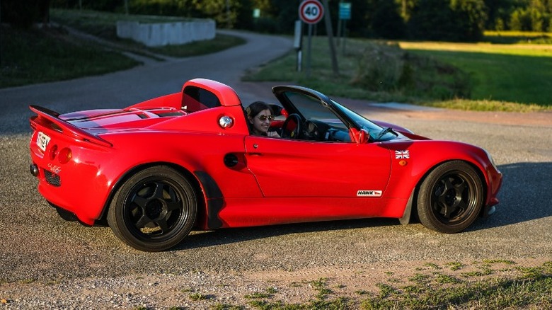 Red Lotus Elise S1 parked on the street