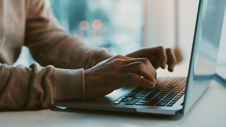 man using mac computer