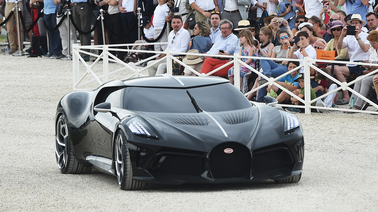 The Bugatti La Voiture Noire on a road