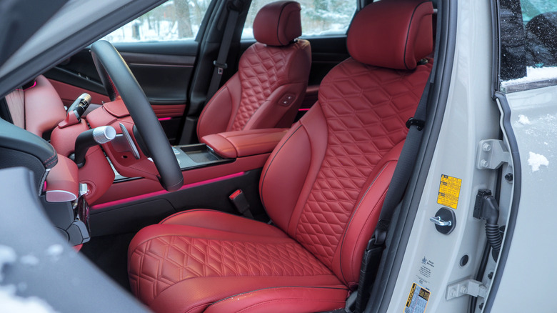 2025 Genesis G80 front seats in Sevilla Red and Obsidian Black