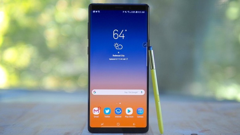 Samsung Galaxy Note 9 standing on a table with S-Pen
