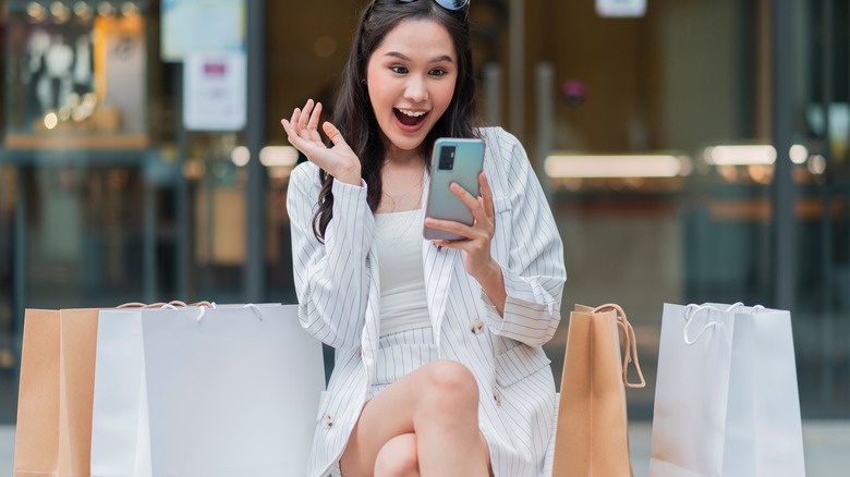 happy woman with shopping bags