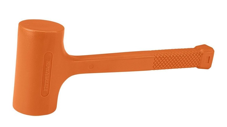 Orange dead blow hammer