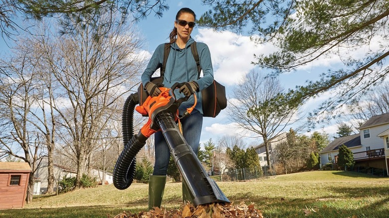 Woman using blower