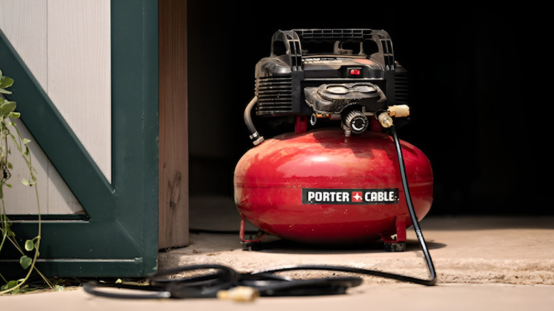 Air compressor sitting on ground