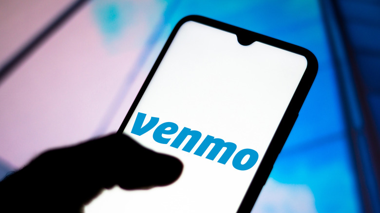 Venmo logo on phone screen