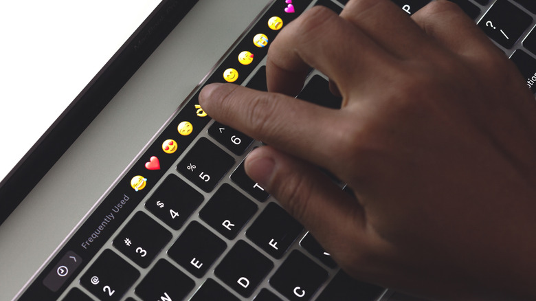 Person using the MacBook Touch Bar