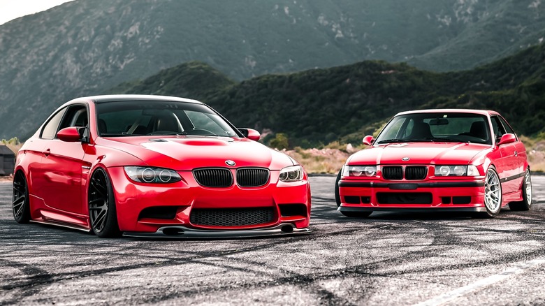 Pair of red BMW 3-series