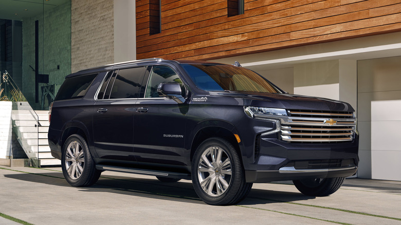 Chevrolet Suburban parked driveway