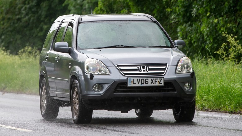 CR-V driving down wet road