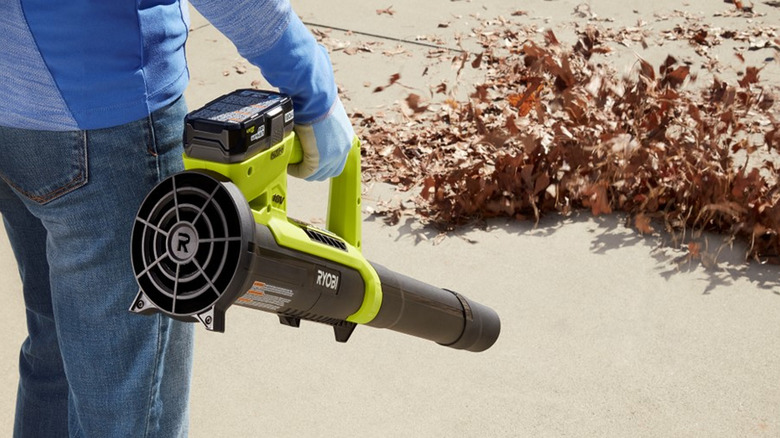 person using ryobi leaf blower