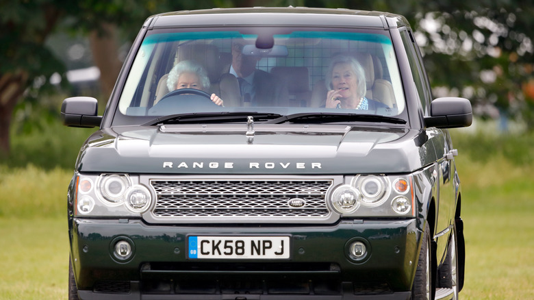 Queen Elizabeth driving Land Rover