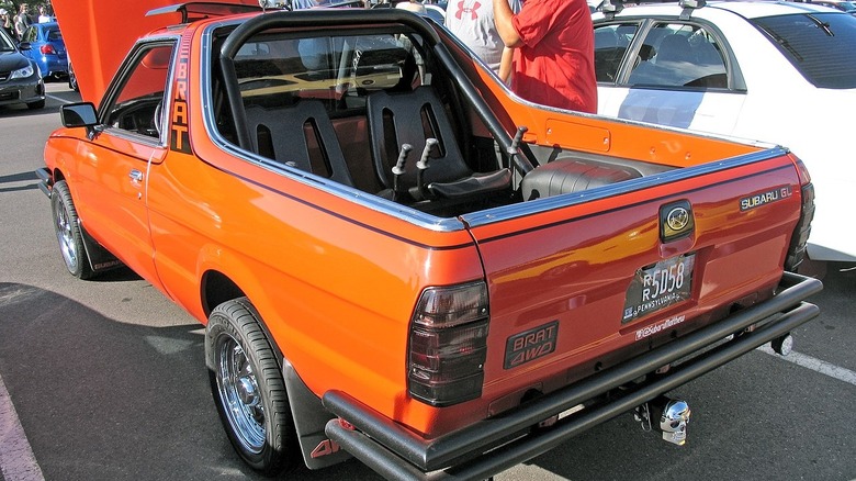 orange Subaru Brat rear quarter