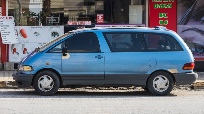 Toyota Previa driver side parked