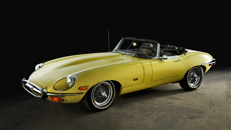 a yellow jaguar e-type