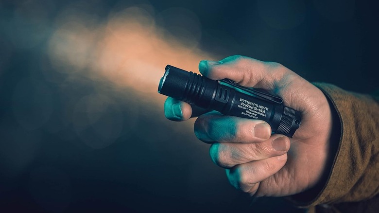 Streamlight 88061 ProTac flashlight in a hand