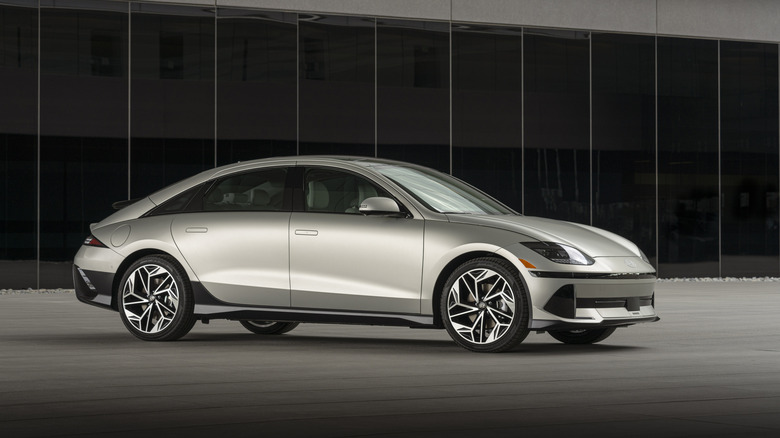 A Hyundai Ioniq 6 in satin bronze, front 3/4 view