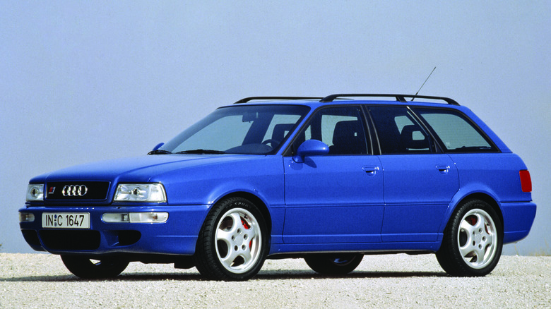 Blue Audi RS2 Avant parked on a gravel road