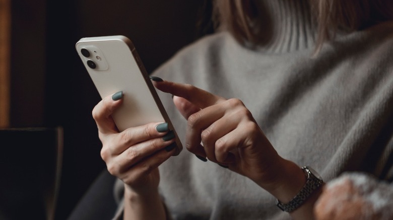 Woman using iPhone