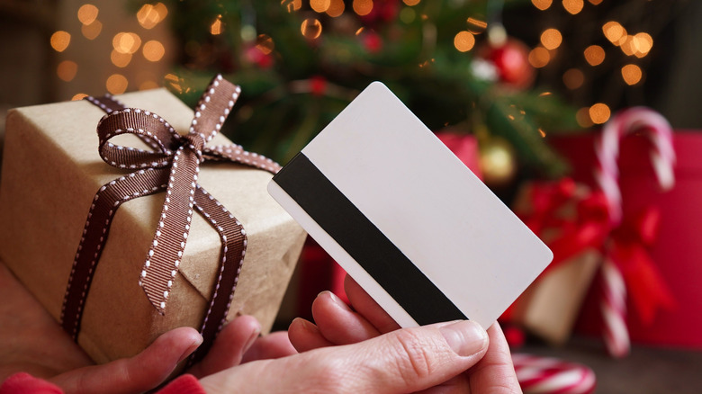 Person holding Christmas gift card