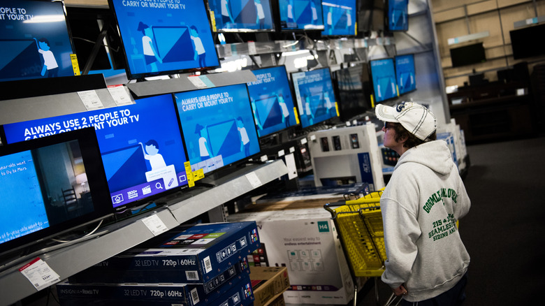 Best Buy display of smaller to medium-sized TVs