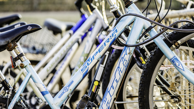 Rack of old department store bicycles, including Huffy