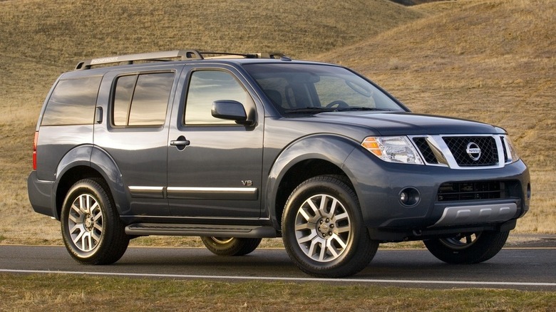 Dark grey 2012 Nissan Pathfinder parked on tarmac