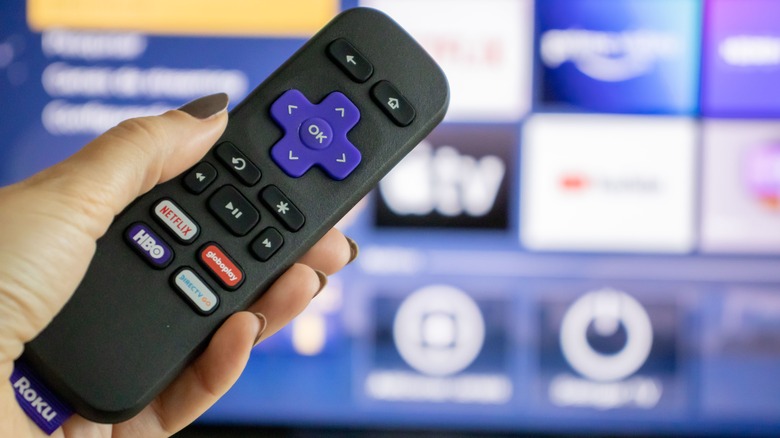 Roku remote in hand