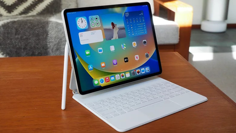 The iPad Pro in a Magic Keyboard with Apple Pencil.
