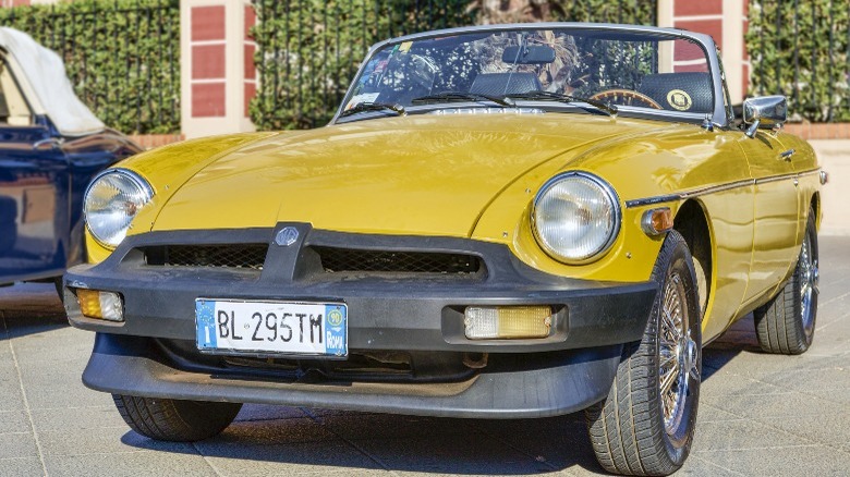 Yellow, convertible MGB Roadster