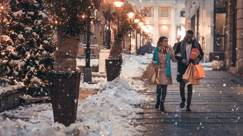 Couple shopping during winter