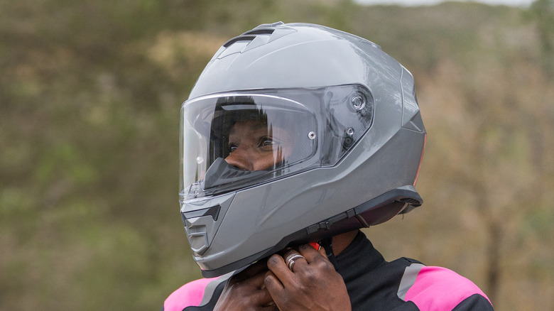 person looking through clear helmet visor