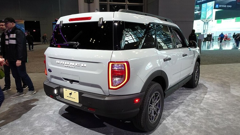 White 2024 Ford Bronco in a showroom