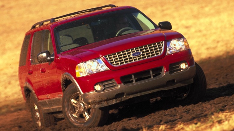 2002 Ford Explorer driving in muddy terrain