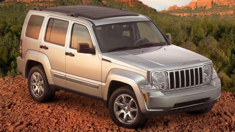 Silver 2009 Jeep Liberty parked