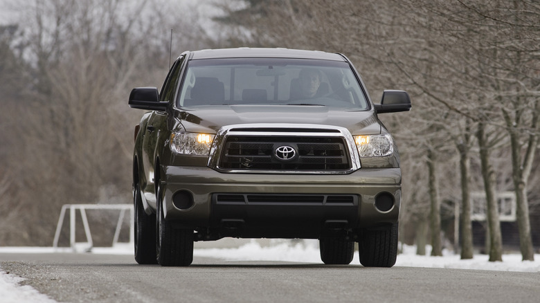 2013 Toyota Tundra driving down snowy road