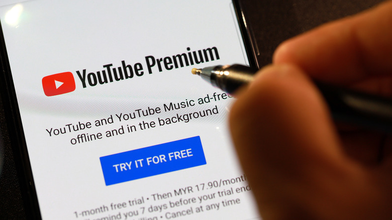 Person signing up to YouTube Premium 