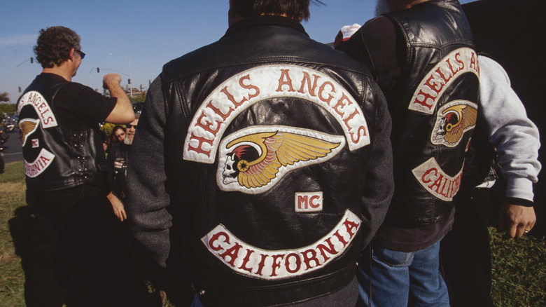 Men with Hells Angels vests standing in a group