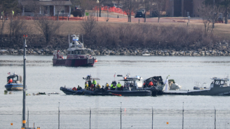 Rescue crews search for potential survivors of the Washington DC helicopter crash